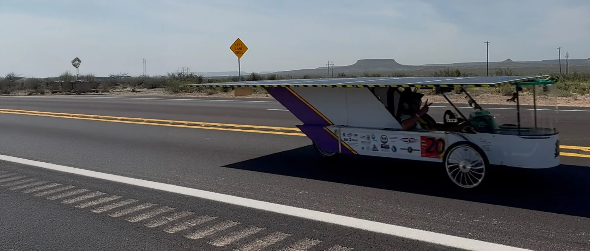 ALSET Paladins solar car driving across the Texas landscape